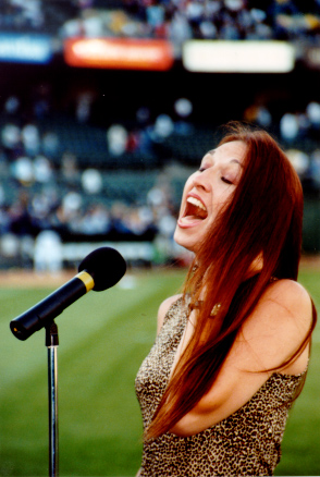 Kimberlee performs for stadium crowd of 41,000 people.